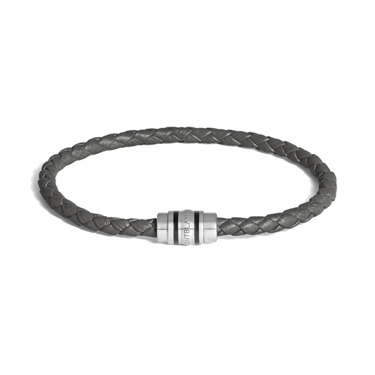 Montblanc 3 Rings Steel Woven Grain Leather Bracelet featuring a braided gray leather band and a cylindrical steel clasp with three black rings.