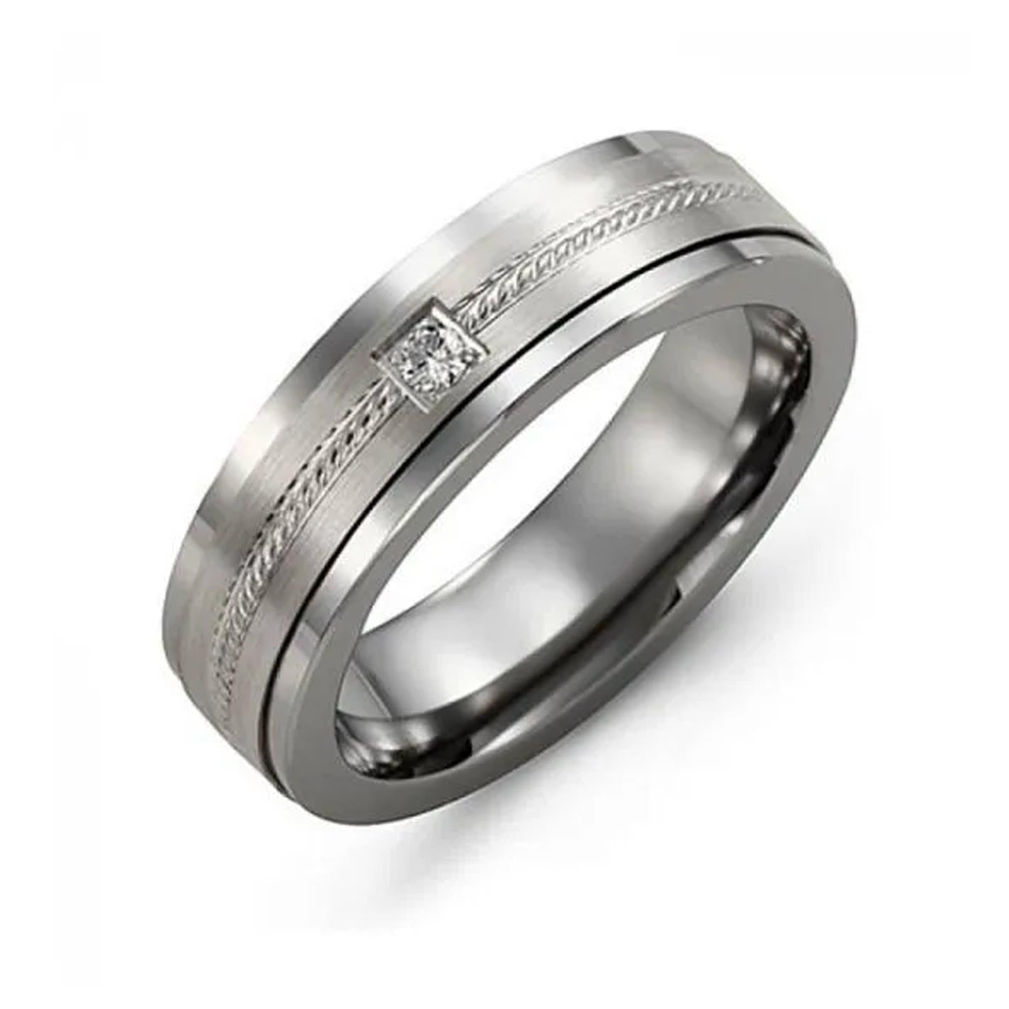 Introducing the Madani Tungsten and 10K White Gold Wedding Band, a refined piece featuring a square diamond elegantly set within a braided pattern. This exquisite design is showcased against a plain white background, echoing modern sophistication.