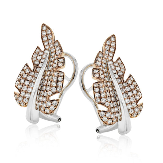 The Simon G 18K White and Rose Gold Diamond Leaf Earrings are an exquisite pair featuring a leaf shape encrusted with small, sparkling diamonds. These organic earrings showcase an intricate design with a mirrored appearance, beautifully blending elegance and luxury under the renowned Simon G brand.