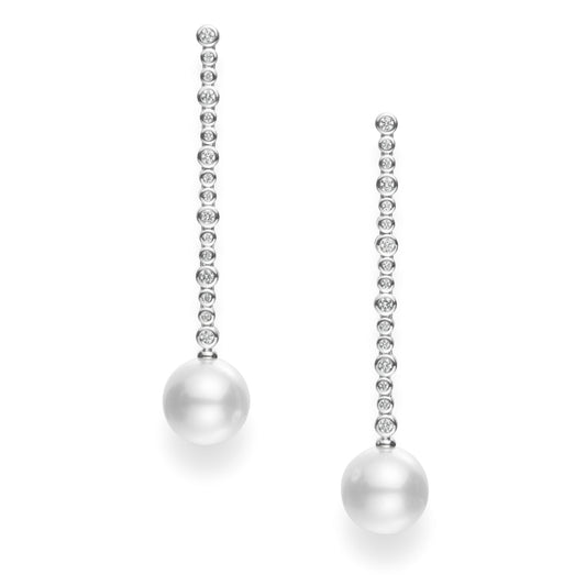 Exuding elegance and sophistication, the Mikimoto 18K White Gold Diamond with South Sea Pearl Drop Earrings feature a series of small, round diamonds leading to a large South Sea pearl at the bottom. This design from Mikimoto emphasizes sparkling gemstones and luxurious pearls for a timeless look.