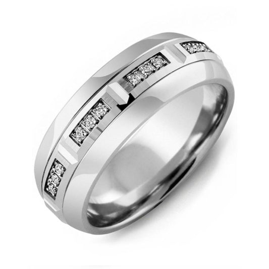 The Madani Tungsten and 10K White Gold Beveled Round Brilliant Diamond Wedding Band features a modern design with small diamond insets around the tungsten band. Its polished finish and clean, angular lines offer an elegant touch.