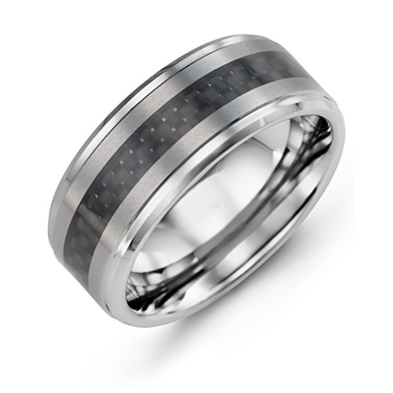 Introducing the Madani Carbon Fiber and Tungsten Wedding Band, a chic creation from the renowned brand Madani. This ring features a polished silver metallic band with a striking black carbon fiber inlay running through the center, set against a white background. Its contemporary design is enhanced by a subtle geometric insert, adding an extra touch of elegance.