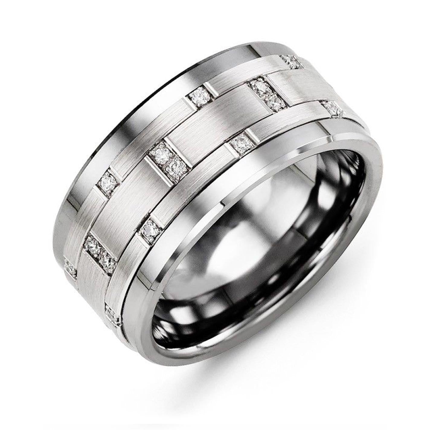 Madani presents the Madani Tungsten and 10K White Gold Wedding Band, featuring a broad, silver tungsten design with a brushed finish and adorned with a scattering of brilliant round diamonds.