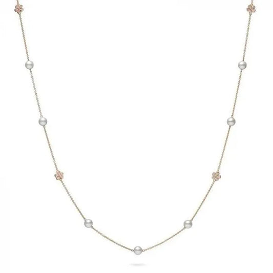 The Mikimoto Cherry Blossom 18K Rose Gold Diamond and Akoya Cultured Pearl Station Necklace showcases a refined design with a slender rose gold chain enhanced by spaced Akoya Cultured Pearls and small rose gold flower details, set against a simple white backdrop.