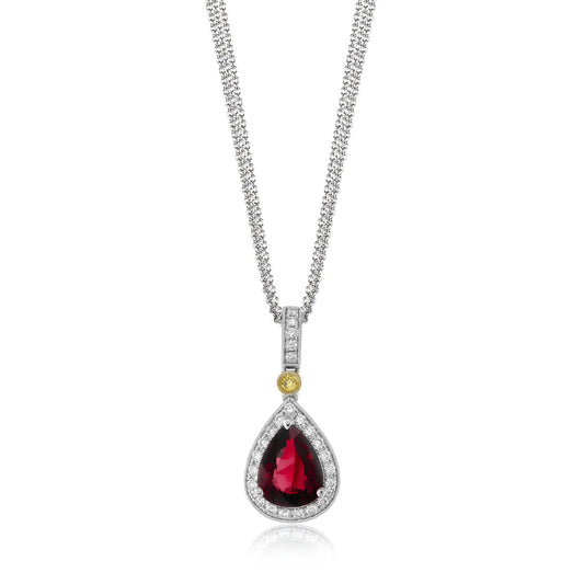 Introducing the Simon G 18K White and Yellow Gold Necklace, showcasing a captivating pear-shaped ruby pendant encircled by a halo of sparkling diamonds. The pendant is elegantly suspended from a bail adorned with diamonds and highlighted by an elegant yellow gemstone accent.