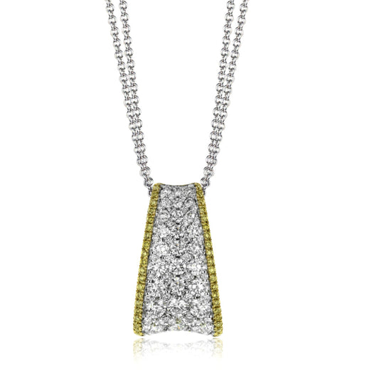 The Simon G. 18K White Gold Diamond Necklace Pendant, featuring a blend of two tones and adorned with round white diamonds encircled by small yellow gemstones, elegantly graces a delicate silver necklace.