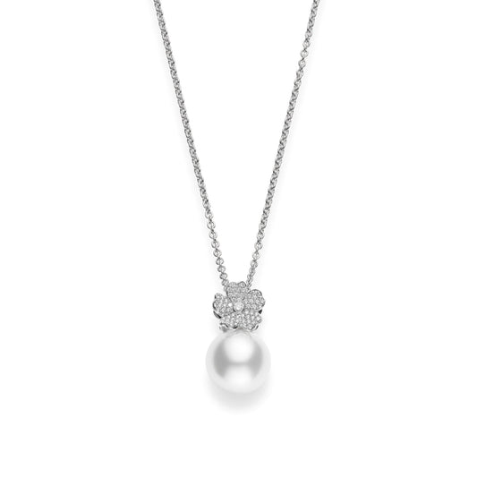 The Mikimoto Cherry Blossom necklace pendant in 18K white gold features a minimalistic and elegant design, with a single large South Sea cultured pearl elegantly suspended from a chain, complemented by a small floral-shaped cluster of diamonds.