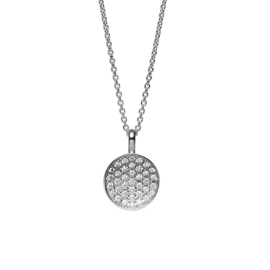The Mikimoto 18K White Gold Diamond Circle Necklace Pendant is a luxurious piece from the renowned brand Mikimoto, featuring a round pendant adorned with small, sparkling gemstones. This elegant design elegantly hangs from an 18K white gold chain, epitomizing fine craftsmanship with simple and refined elegance.