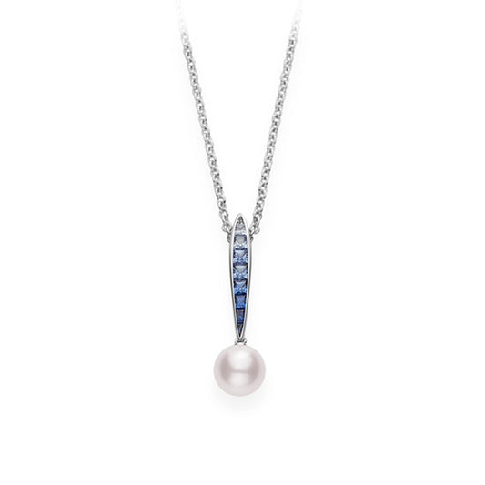 Introducing the Mikimoto 18K White Gold Sapphire with Akoya Cultured Pearl Ocean Necklace Pendant: a stunning piece showcasing a pendant with an elongated tapered design featuring a single Akoya cultured pearl elegantly accented by small sapphire gemstones. The simple and elegant chain perfectly complements this delicate pendant, offering a sophisticated touch.