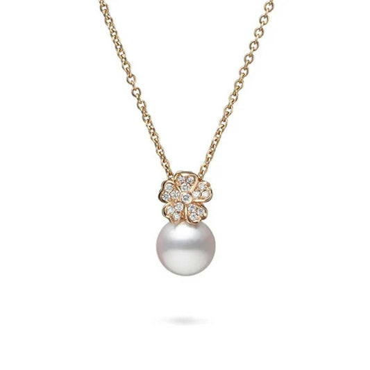 The Mikimoto Cherry Blossom 18K Rose Gold Diamonds and Akoya Cultured Pearl Necklace Pendant showcases an exquisite design with a rose gold chain featuring a dazzling flower-shaped pendant embellished with petite diamonds. Suspended below the cherry blossom motif is a solitary Akoya cultured pearl, lending the piece an air of elegance and timeless sophistication.