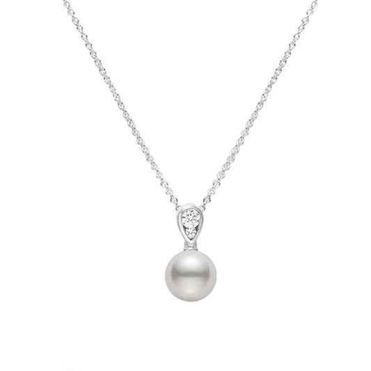 The Mikimoto 18K White Gold Diamond with Akoya Cultured Pearl Necklace Pendant is a masterpiece, featuring a beautiful round pearl suspended from an elegant chain. The 18-karat white gold design includes a delicate teardrop-shaped accent above the pearl, adorned with tiny diamonds that glisten against a plain white backdrop, adding sophistication to any outfit.