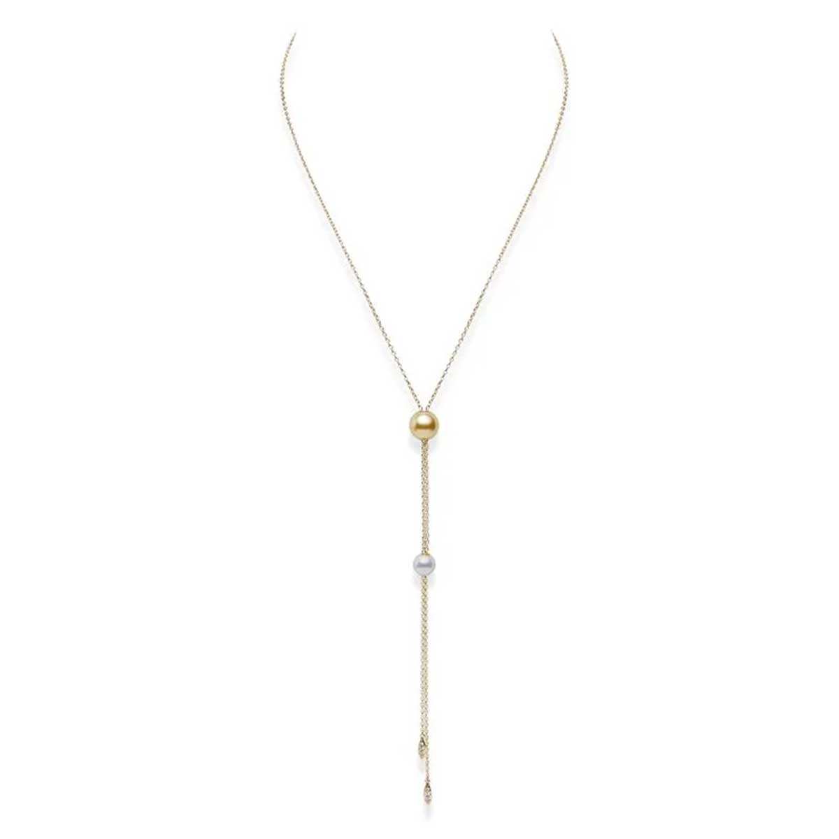 A sophisticated Mikimoto Pearls In Motion necklace, crafted in 18 Karat Yellow Gold, showcases Akoya and Golden South Sea cultured pearls with a polished finish and adjustable pendant design.