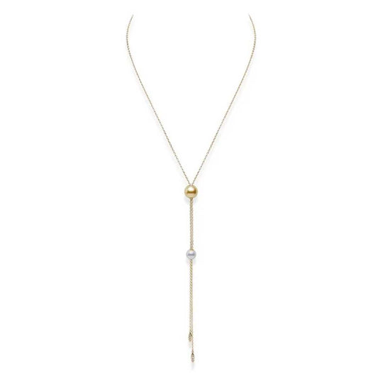 A sophisticated Mikimoto Pearls In Motion necklace, crafted in 18 Karat Yellow Gold, showcases Akoya and Golden South Sea cultured pearls with a polished finish and adjustable pendant design.