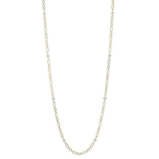 The Mikimoto M Code necklace, designed by Mikimoto, is crafted from 18K yellow gold and showcases a long chain of thin links interspersed with small Akoya cultured pearls.