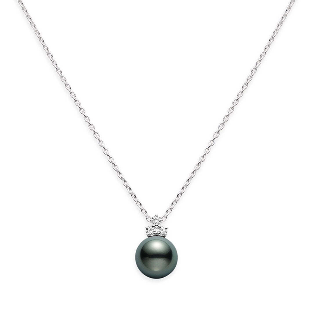 The Mikimoto 18K White Gold Classic Black South Sea Cultured Pearl with Diamond Necklace Pendant showcases luxurious jewelry against a white backdrop.