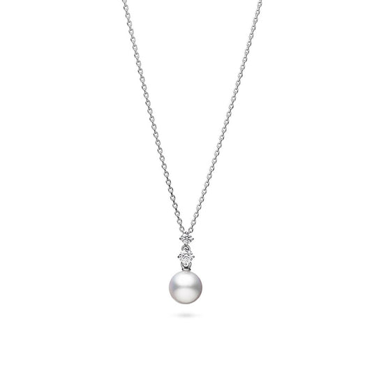 Introducing the Mikimoto Morning Dew 18K White Gold Pearl Drop Necklace Pendant, which features a delicately crafted 18K white gold chain showcasing an Akoya cultured pearl. Above the pearl are three vertically arranged sparkling crystals, creating an aura of sophistication and timeless charm that is synonymous with the Mikimoto brand.