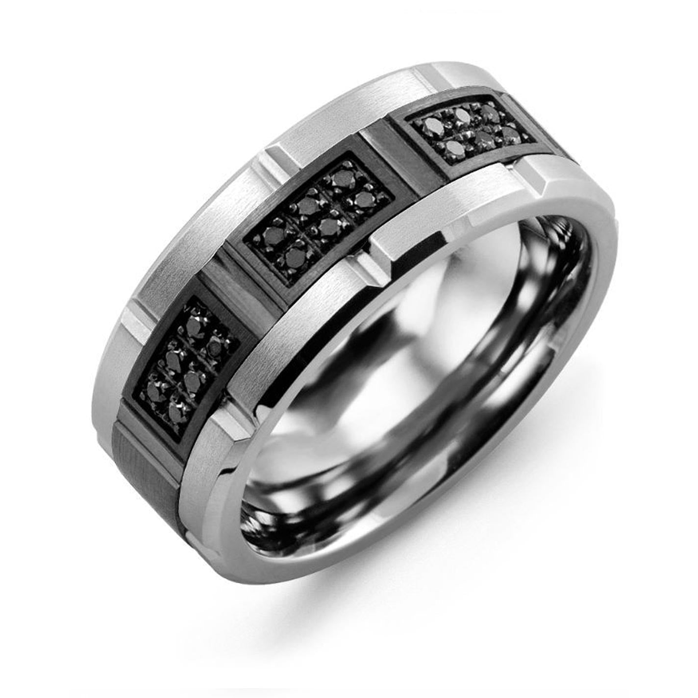 The Madani Tungsten and 10K Black Gold Wedding Band highlights a modern and elegant design with its silver and black finish. It features three rectangular sections embedded with black diamonds, contrasting its smooth, polished interior against a textured exterior.