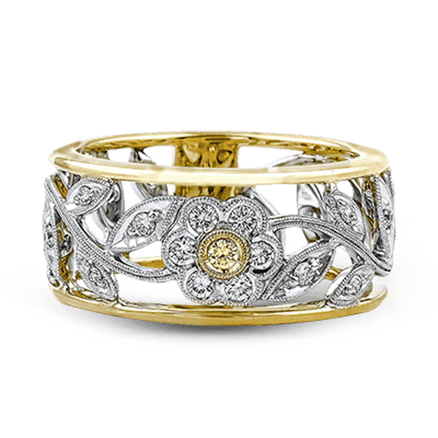 The Simon G. 18K Yellow and White Gold Fashion Diamond Ring combines gold and silver with intricate floral patterns. Delicate leaves surround a central flower, adorned by a small yellow gem encircled in silver detailing, beautifully capturing the essence of a classic floral aesthetic.