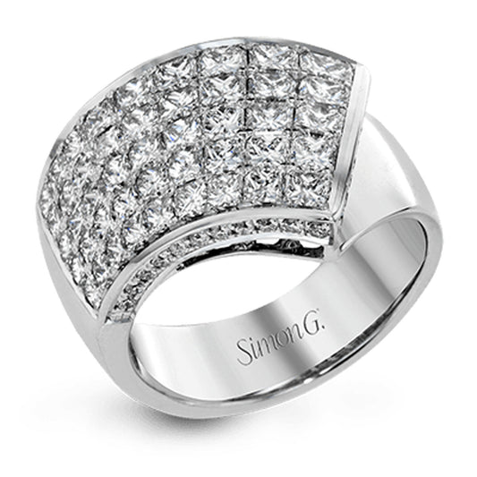 This stunning ring from Simon G features an 18K white gold band elegantly adorned with numerous small princess cut diamonds set in a grid pattern across the top half. The inside of the band is engraved with the brand name, "Simon G.
