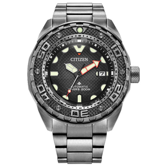 Introducing the CITIZEN Promaster Dive Super Titanium Automatic Mechanical 46mm Watch by CITIZEN. This timepiece showcases a titanium band and case, complemented by a black textured dial, luminescent hands and markers, a date display at the 3 o'clock position, and a unidirectional bezel designed for diving enthusiasts. With its 200M water resistance capability, it is ideal for underwater adventures.