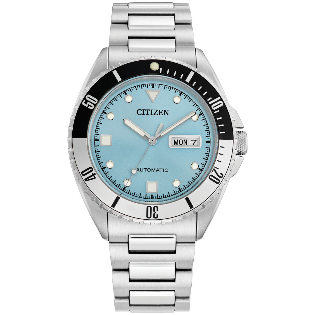 The CITIZEN Sport Automatic 42mm Watch, from the Automatics Collection by CITIZEN, features a teal dial, black bezel, and silver indices. Displaying "MON" and "7," this wristwatch boasts a stainless steel band and high-performance movement in its automatic design.