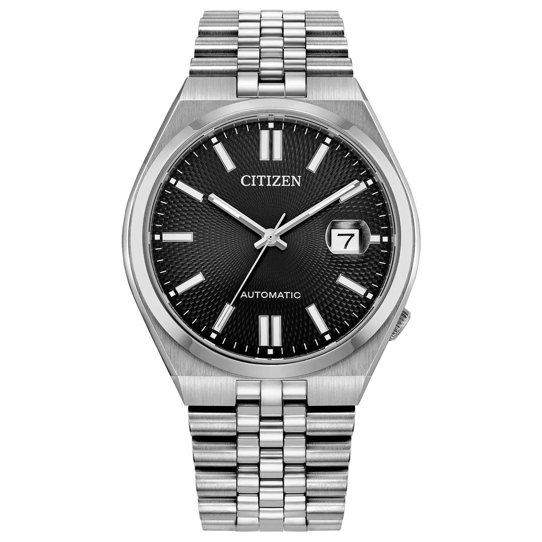 The CITIZEN TSUYOSA 60 Automatic 40mm Watch features a silver case and bracelet, black textured dial, silver hour markers and hands, date window at 3 o’clock displaying “7”, and shows the time at 10:08.