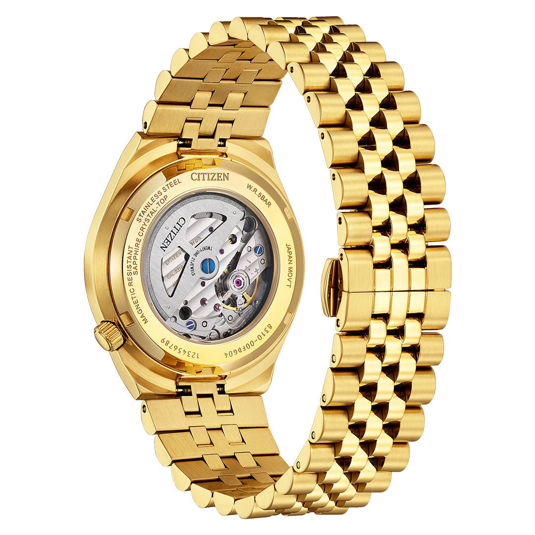 A CITIZEN TSUYOSA 60 Automatic 40mm Watch is shown from the back, featuring its stainless steel bracelet in a yellow gold-tone and a transparent case back that reveals the automatic calibre 8310 movement. This CITIZEN timepiece combines classic elegance with the precision of a modern sport watch.
