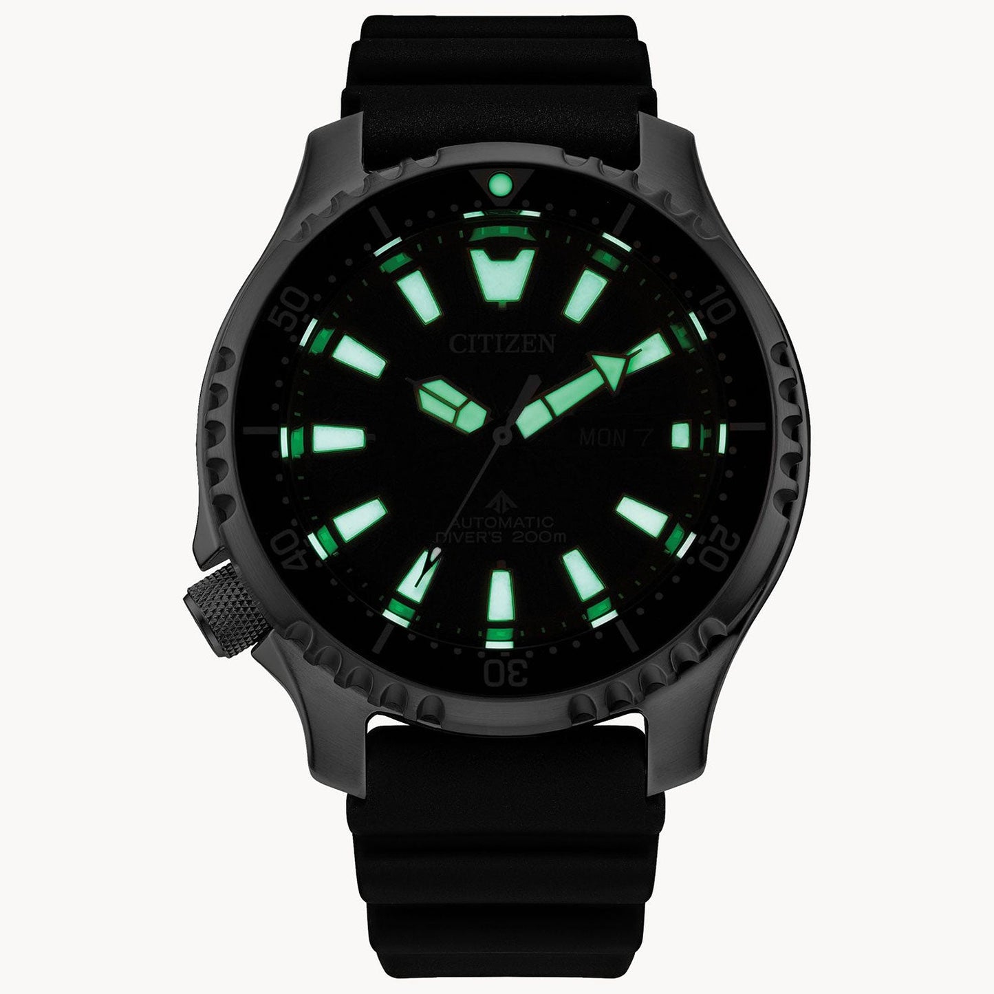 The CITIZEN Promaster Dive Automatic Mechanical 44mm Watch is a durable dive watch featuring a black case and rubber strap. It includes luminous green markers and hands for visibility in the dark, clearly displaying the time and date. This water-resistant timepiece is designed to withstand depths of up to 200 meters, making it ideal for underwater adventures.