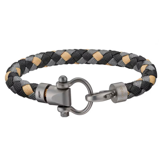 The OMEGA Aqua Sailing 007 Edition Nylon Bracelet features black, gray, and beige braids with a metallic shackle clasp—a stylish titanium design inspired by OMEGA accessories.