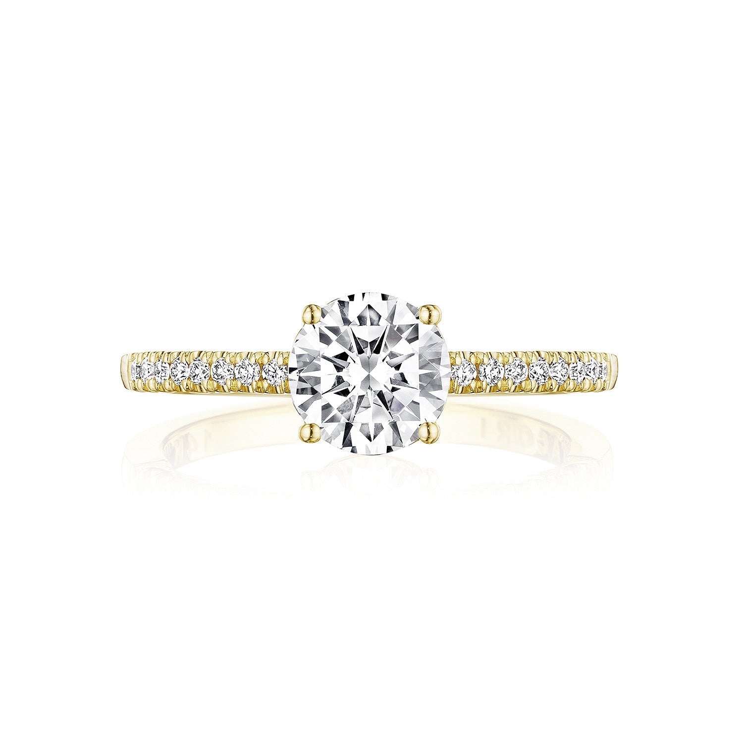 Explore the Tacori Coastal Crescent, a sophisticated 14K yellow gold engagement ring with a round brilliant solitaire semi-mount. The diamond-adorned band adds extra brilliance and elegance, making it an ideal representation of everlasting love.