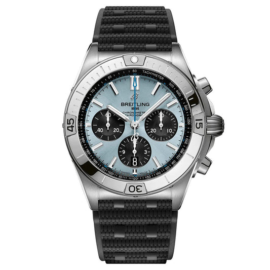 Introducing the sophisticated BREITLING Chronomat B01 42, featuring a black rubber strap and a stainless steel case. Its captivating teal dial showcases three subdials, silver hour markers, and a tachymeter scale on the bezel. This COSC-certified chronometer is equipped with luminescent hands and markers for outstanding readability.