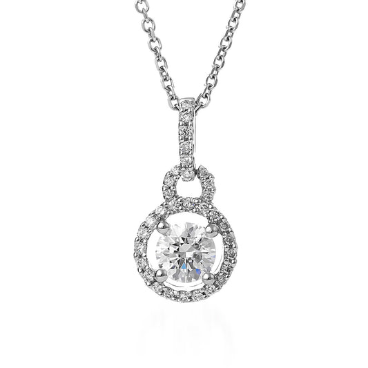 This Raffi&Co. necklace showcases a stunning round brilliant lab center diamond surrounded by smaller mined accent diamonds, all set in a halo design. The simple 18K white gold chain enhances the sparkle of the pendant.