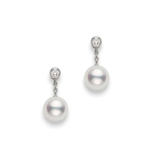 The Mikimoto 18K White Gold Diamond Akoya Cultured Pearl Drop Earrings for a touch of elegance, featuring round, lustrous pearls gracefully suspended from sparkling diamonds.