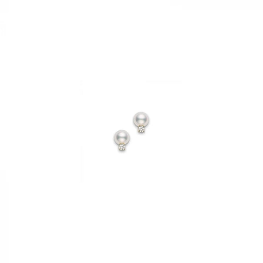 Introducing the Mikimoto 18K Yellow Gold Diamond with Akoya Cultured Pearl Stud Earrings: an elegant pair of stud earrings showcasing refined Akoya cultured pearls, each adorned with a shimmering diamond beneath, delicately set in luxurious 18-karat yellow gold against a simple white backdrop.