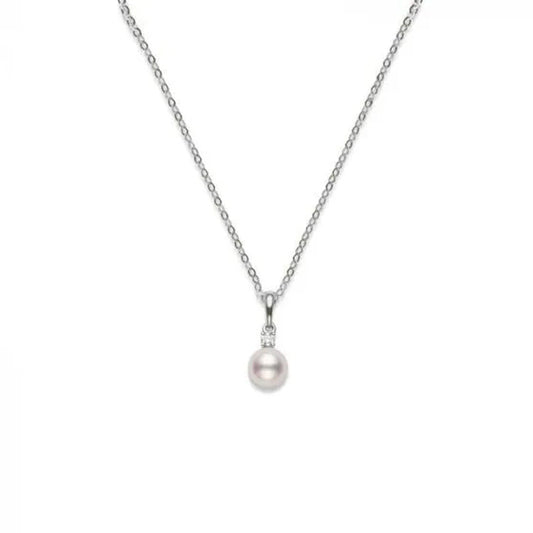 The Mikimoto 18K White Gold Diamond with Akoya Cultured Pearl Necklace Pendant showcases a refined design, featuring an Akoya cultured pearl elegantly accented by a small diamond, all set against a plain white background.