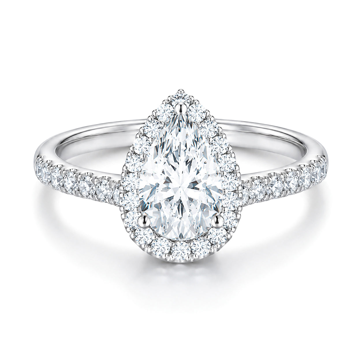 The Raffi&Co.® 14K White Gold Pear Halo Diamond Engagement Ring features a 3.02 ct pear-shaped center diamond, surrounded by a halo of smaller diamonds on a slim 14K white gold band.