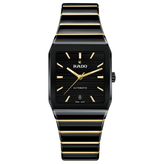 The RADO Anatom Automatic 32.5mm Watch features a black face with gold hour markers and hands, a date display at 6 o'clock, and a black-and-gold striped high-tech ceramic bracelet under sapphire crystal.