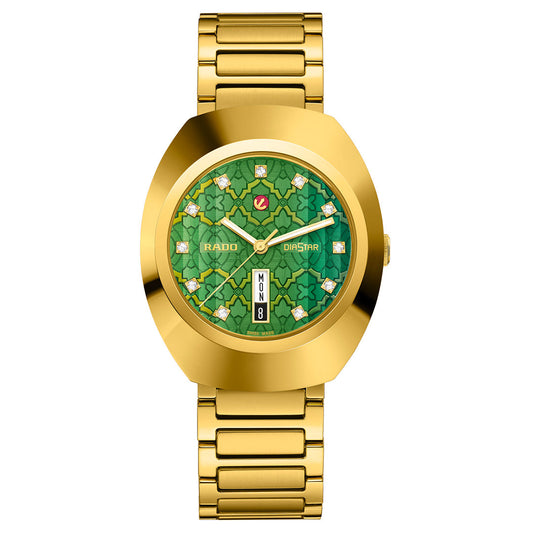 The RADO DiaStar Original Automatic 38mm Watch features a gold case and band, green clover-patterned dial, sapphire crystal, gold markers, diamond accents, and day-date display at 6 o’clock.
