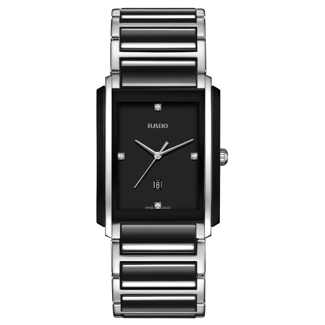 The RADO Intergal Diamonds Quartz 31mm Watch combines a rectangular case, black dial, silver hands, diamond markers, date at 6 o’clock, and a silver metal strap with black high-tech ceramic links for a luxurious look.