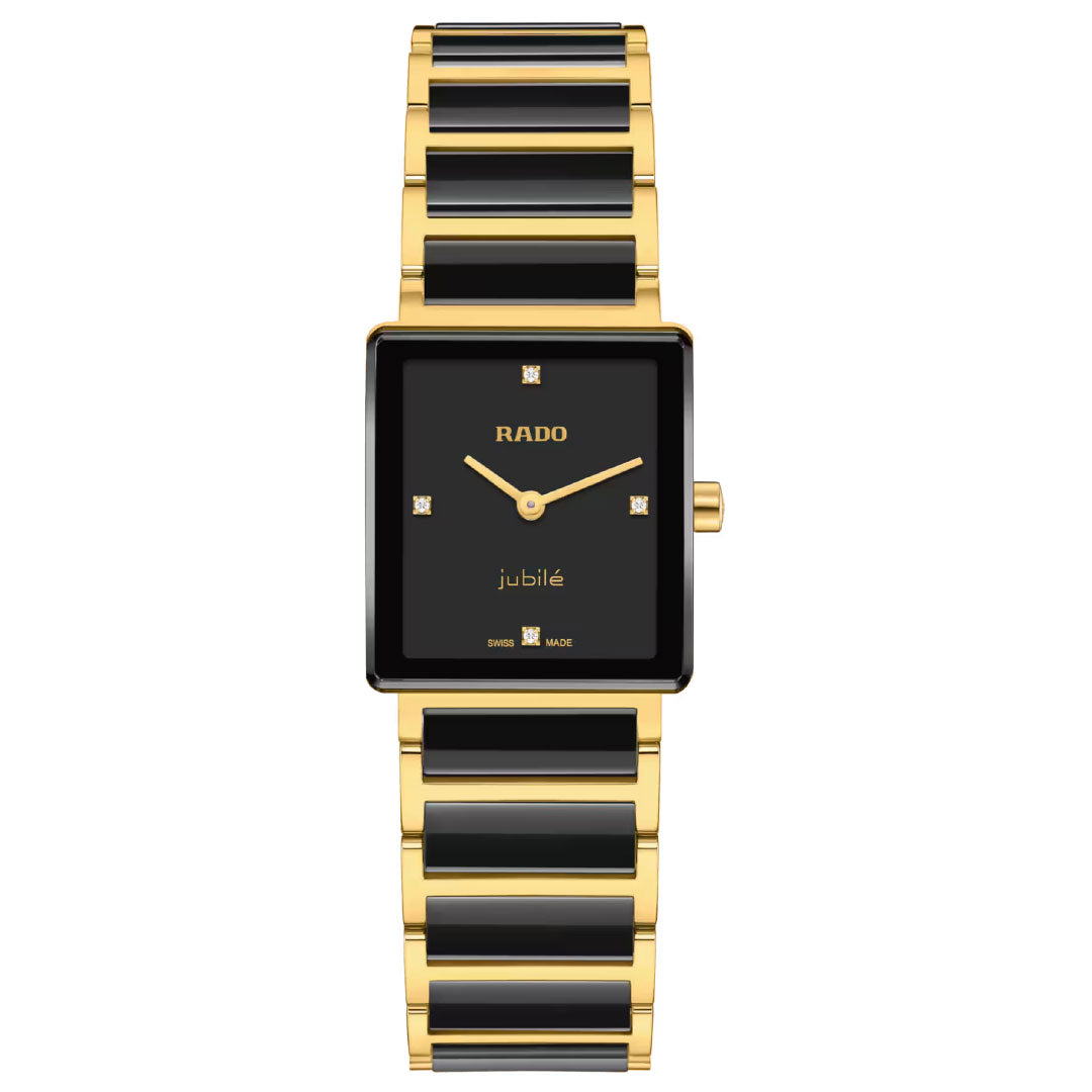 The RADO Integral Diamonds Quartz 23mm Watch features a rectangular black dial with gold hour markers, "RADO" and "jubile" on the face, high-tech ceramic construction, and a yellow gold stainless steel linked bracelet.