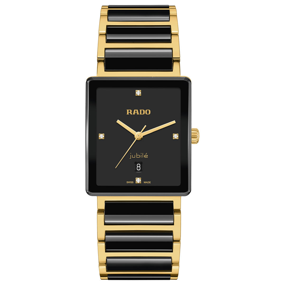 The RADO Integral Diamonds Quartz 31.5mm Watch features a rectangular gold and black case, diamond hour markers, sapphire crystal, date display, and a metal band with alternating gold and black links.