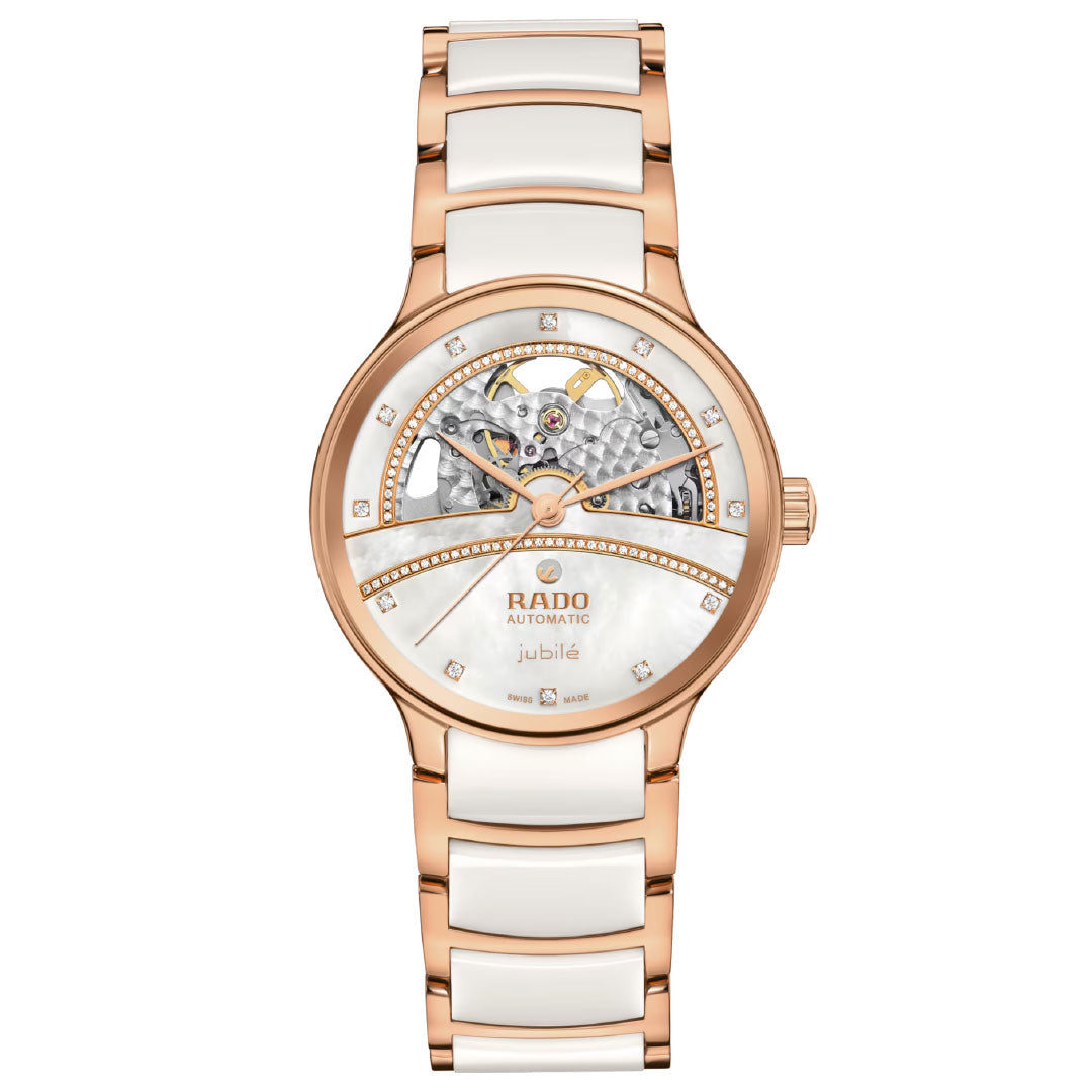The RADO Centrix Automatic Diamonds Open Heart 35mm Watch features a skeleton dial, diamond hour markers, and a rose gold and white ceramic bracelet, with "Rado automatic jubilee" text on the face.