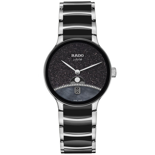 The RADO Centrix Moonphase Quartz 35mm Watch features a silver and black high-tech ceramic band, round black glittery dial with silver hands, date window at 6 o'clock, and decorative stones on the lower half.