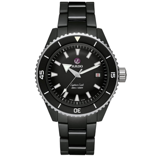 The RADO Captain Cook Automatic 43mm Watch features a black dial with silver markers and hands, powered by an automatic movement. It includes a date display at the 3 o'clock position and offers water resistance up to 300 meters. This diver's watch blends high-tech ceramic in its bracelet with stainless steel accents, ensuring both durability and style.