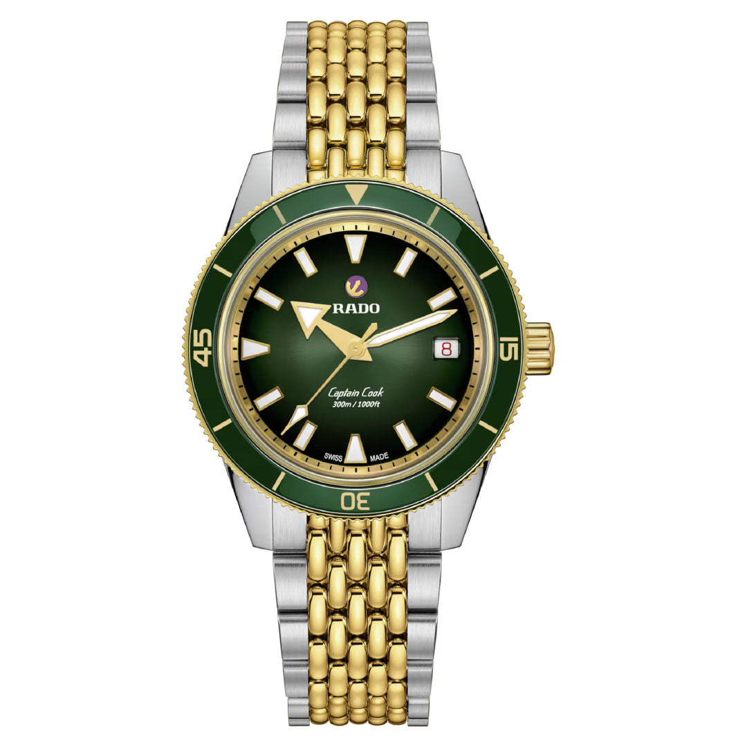 The RADO Captain Cook Automatic 39mm Watch features a green dial and bezel, gold and silver two-tone bracelet, gold hour markers and hands, automatic movement, and a date display at 3 o’clock.