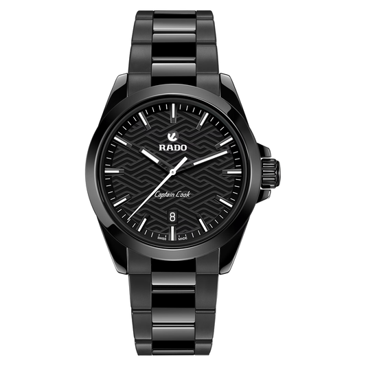 RADO Captain Cook Discover Automatic 40.7mm watch in black high-tech ceramic with a link bracelet, featuring a black geometric dial, luminous hands, and a date display at the six o’clock position.