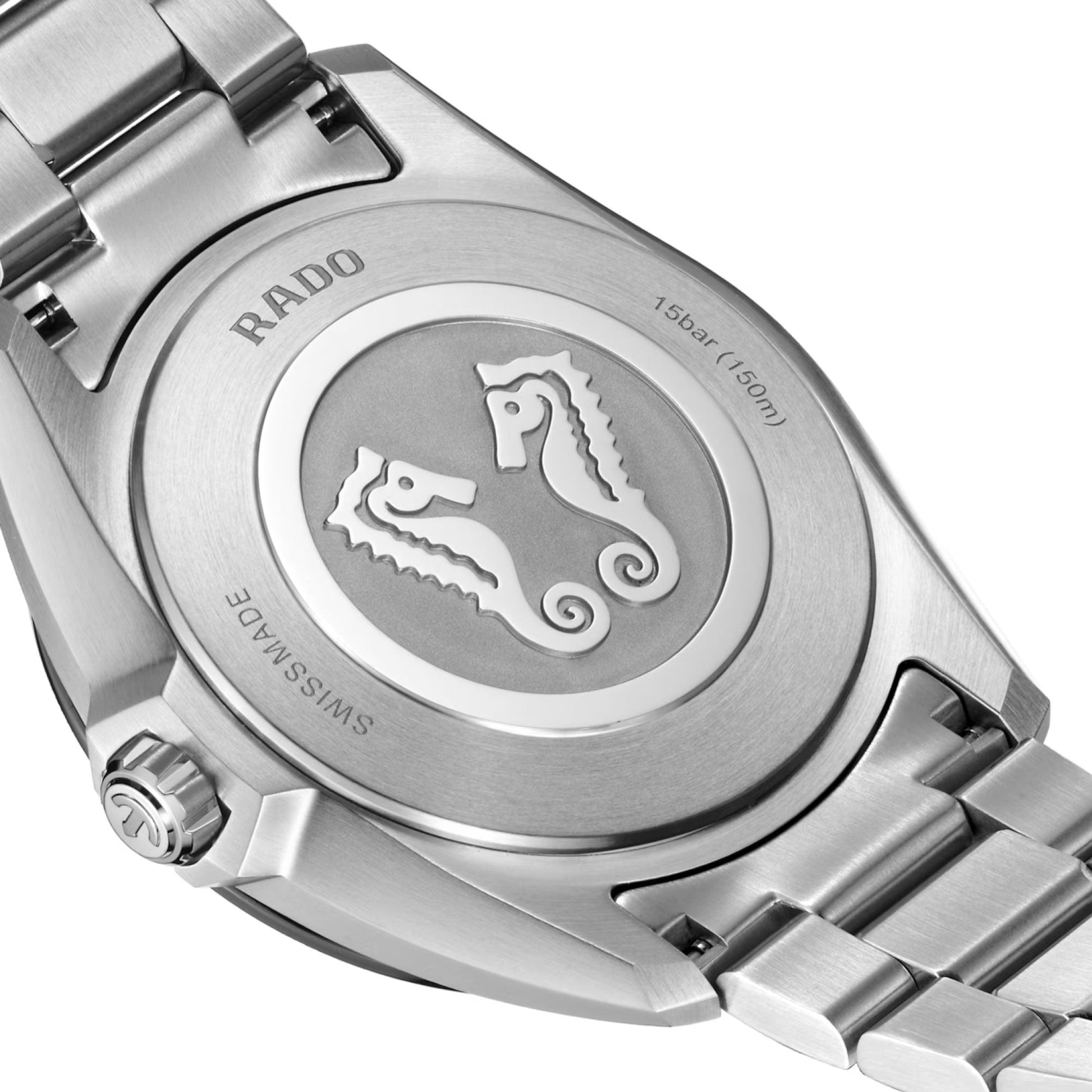 Close-up of the back of the RADO HyperChrome Quartz 41.5mm Watch showing two seahorse engravings, "15 bar (150 m)", "SWISS MADE" text, a high-tech ceramic bezel, and powered by the Rado calibre R292 Quartz movement.