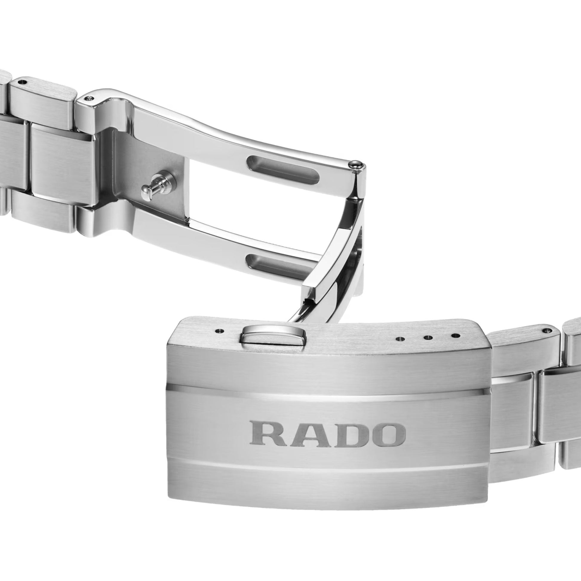 Close-up of the RADO HyperChrome Quartz 41.5mm Watch's stainless steel bracelet with a partially open deployment clasp, engraved with the "RADO" logo and showcasing its polished components beneath a high-tech ceramic bezel.