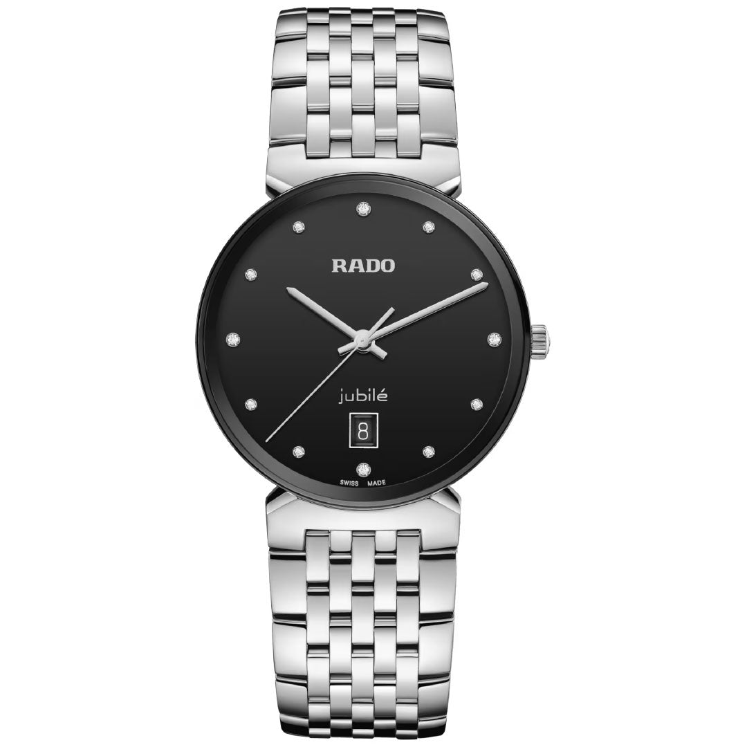 The RADO Florence Diamonds Quartz 38mm Watch features a silver stainless steel band, black round face, silver hour markers, date display at 6 o’clock, and subtle RADO branding near 12 o’clock for a minimalistic and elegant look.