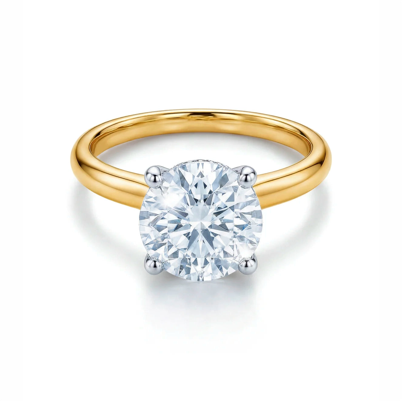 The Raffi&Co.® 14K Yellow Gold Round Brilliant Lab Diamond Solitaire Engagement Ring features a large round diamond in a four-prong white metal setting, shown against a white background.